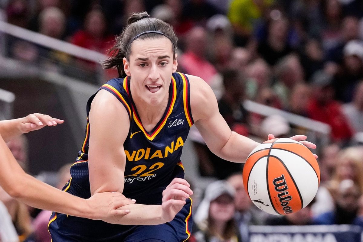Indiana Fever guard Caitlin Clark (22) rushes up the court Sunday, Sept. 15, 2024, during the game at Gainbridge Fieldhouse in Indianapolis. The Indiana Fever defeated the Dallas Wings, 110-109.
