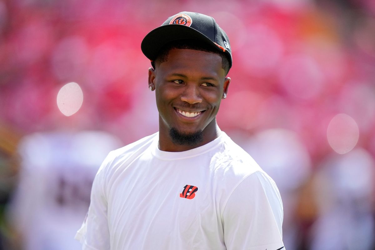 Injured Cincinnati Bengals wide receiver Tee Higgins (5) walks the field before the first quarter of the NFL Week 2 game between the Kansas City Chiefs and the Cincinnati Bengals at Arrowhead Stadium in Kansas City on Sunday, Sept. 15, 2024. The Bengals led 16-10 at halftime.