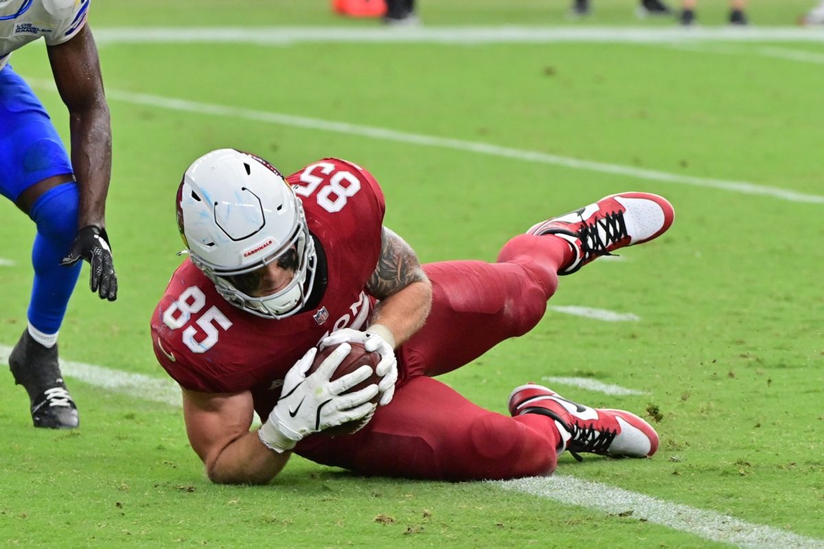 Sep 15, 2024; Glendale, Arizona, USA;  Arizona Cardinals tight end Trey McBride (85) recovers a fumble in the end zone for a touchdown in the second half against the Los Angeles Rams at State Farm Stadium. Mandatory Credit: Matt Kartozian-Imagn Images