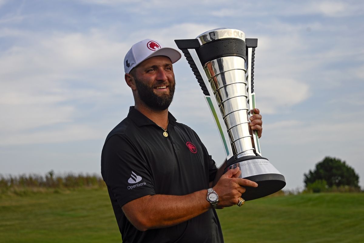 Sep 15, 2024; Bolingbrook, Illinois, USA; Jon Rahm of the Legion XIII holds the individual trophy after winning the LIV Golf Chicago tournament at Bolingbrook Golf Club. Mandatory Credit: Matt Marton-Imagn Images