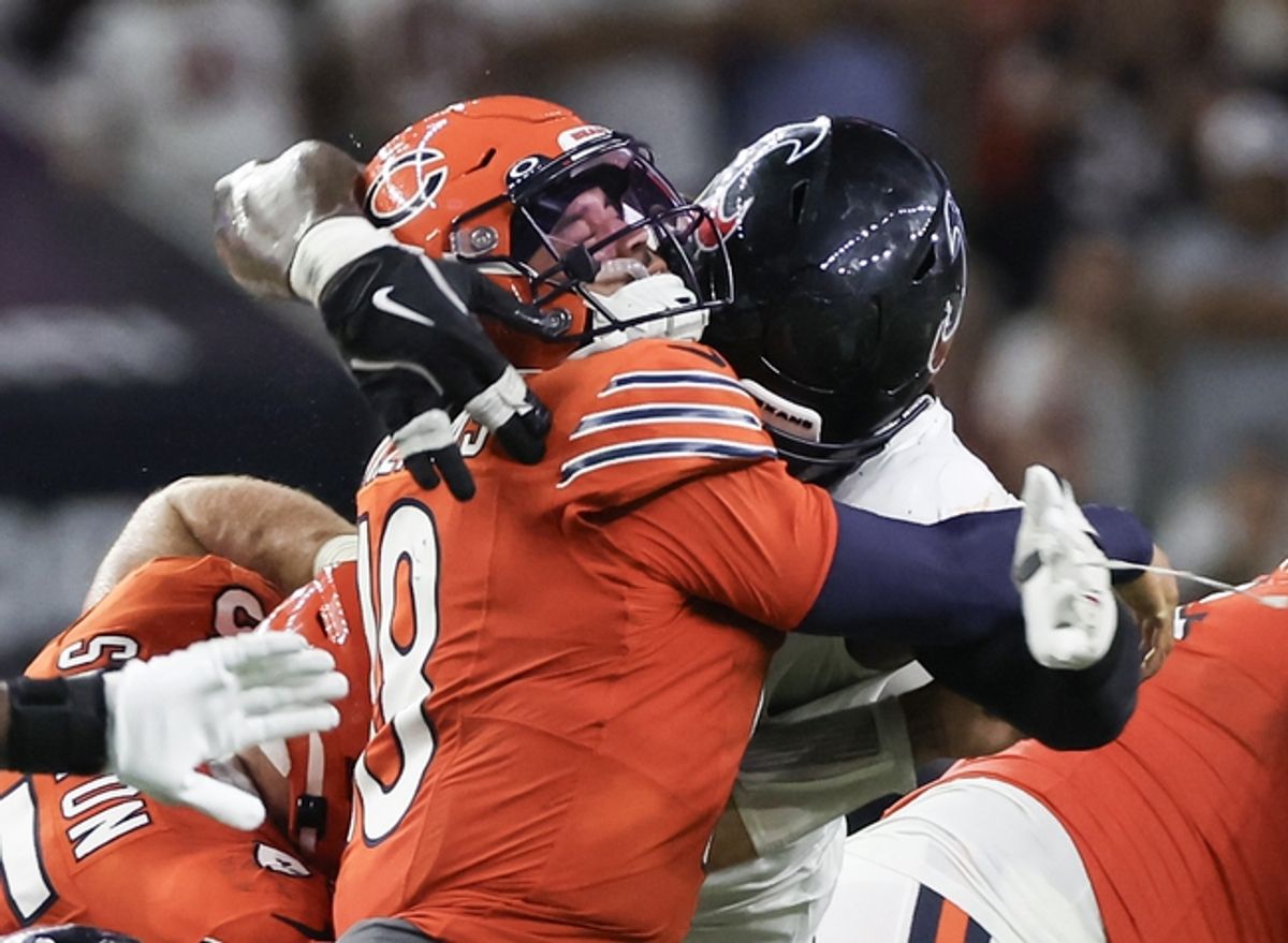 Chicago Bears quarterback Caleb Williams (18) absorbs a hit in the second half of a Week 2 loss at Houston. Mandatory Credit: Thomas Shea-Imagn Images