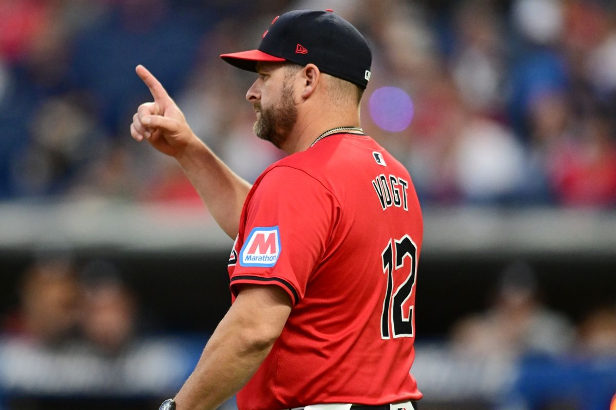 Sep 16, 2024; Cleveland, Ohio, USA; Cleveland Guardians manager Stephen Vogt (12) calls to the bullpen during the third inning against the Minnesota Twins at Progressive Field. Mandatory Credit: Ken Blaze-Imagn Images