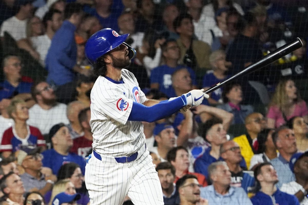 Sep 16, 2024; Chicago, Illinois, USA; Chicago Cubs shortstop Dansby Swanson (7) hits a three-run home run against the Oakland Athletics during the second inning at Wrigley Field. Mandatory Credit: David Banks-Imagn Images