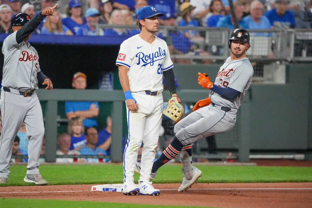 Sep 16, 2024; Kansas City, Missouri, USA; Detroit Tigers third baseman Zach McKinstry (39) reaches third base safely after hitting a triple against the Kansas City Royals in the fourth inning at Kauffman Stadium. Mandatory Credit: Denny Medley-Imagn Images