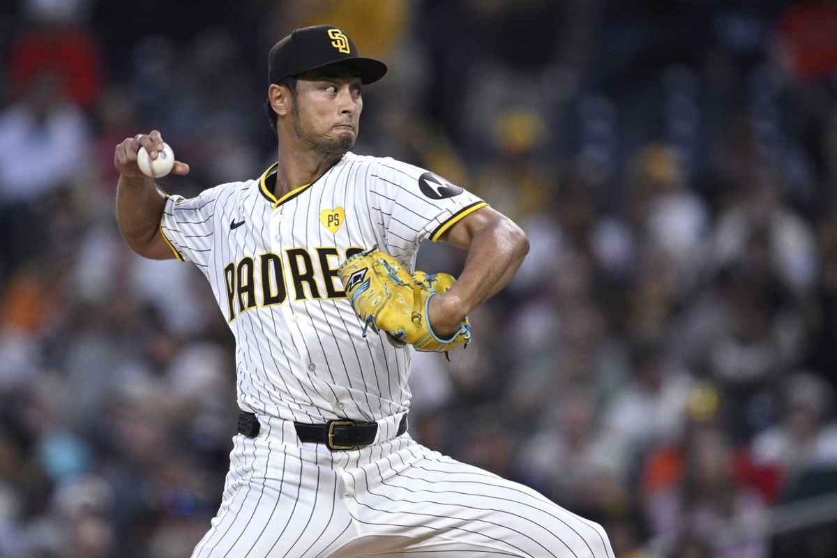 Sep 16, 2024; San Diego, California, USA; San Diego Padres starting pitcher Yu Darvish (11) pitches against the Houston Astros during the first inning at Petco Park. Mandatory Credit: Orlando Ramirez-Imagn Images