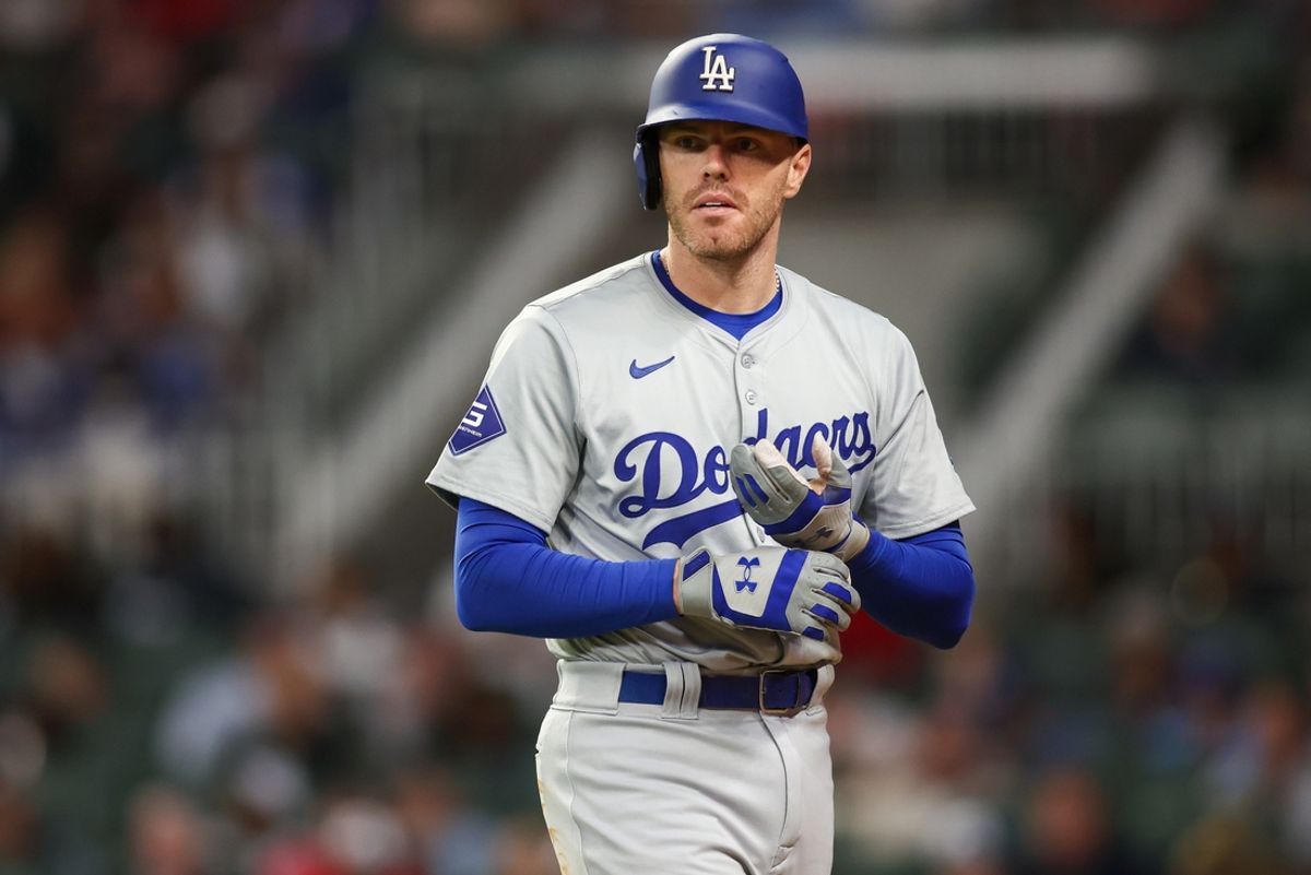 Sep 16, 2024; Atlanta, Georgia, USA; Los Angeles Dodgers first baseman Freddie Freeman (5) walks to the dugout after a called strikeout against the Atlanta Braves in the sixth inning at Truist Park. Mandatory Credit: Brett Davis-Imagn Images