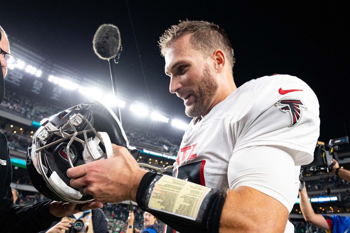 Sep 16, 2024; Philadelphia, Pennsylvania, USA; Atlanta Falcons quarterback Kirk Cousins (18) removes his helmet after a victory Philadelphia Eagles at Lincoln Financial Field. Mandatory Credit: Bill Streicher-Imagn Images