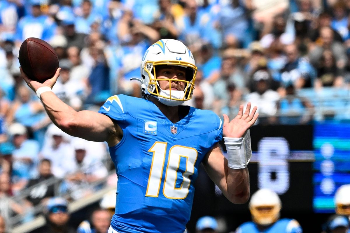 Sep 15, 2024; Charlotte, North Carolina, USA;  Los Angeles Chargers quarterback Justin Herbert (10) looks to pass in the second quarter at Bank of America Stadium. Mandatory Credit: Bob Donnan-Imagn Images