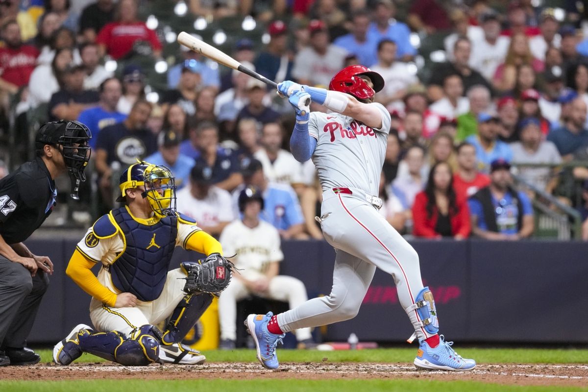 Sep 17, 2024; Milwaukee, Wisconsin, USA;  Philadelphia Phillies first baseman Bryce Harper (3) hits a home run during the sixth inning against the Milwaukee Brewers at American Family Field. Mandatory Credit: Jeff Hanisch-Imagn Images