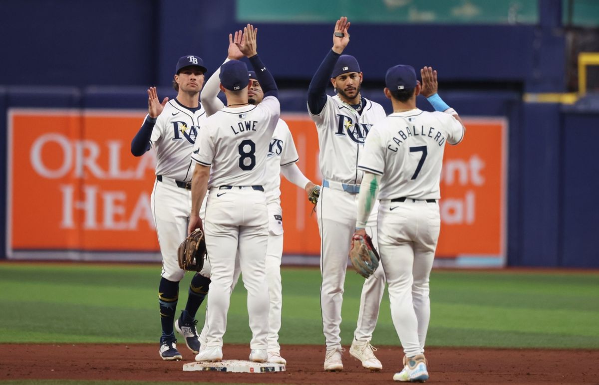 Sep 17, 2024; St. Petersburg, Florida, USA;Tampa Bay Rays shortstop Jose Caballero (7), outfielder Jose Siri (22), second base Brandon Lowe (8), left fielder Christopher Morel (24) and outfielder Josh Lowe (15) celebrate beating the Boston Red Sox at Tropicana Field. Mandatory Credit: Kim Klement Neitzel-Imagn Images