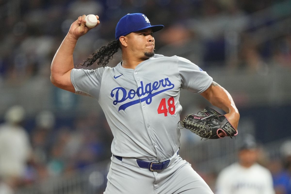 Sep 17, 2024; Miami, Florida, USA;  Los Angeles Dodgers pitcher Brusdar Graterol (48) pitches in the ninth inning against the Miami Marlins at loanDepot Park. Mandatory Credit: Jim Rassol-Imagn Images