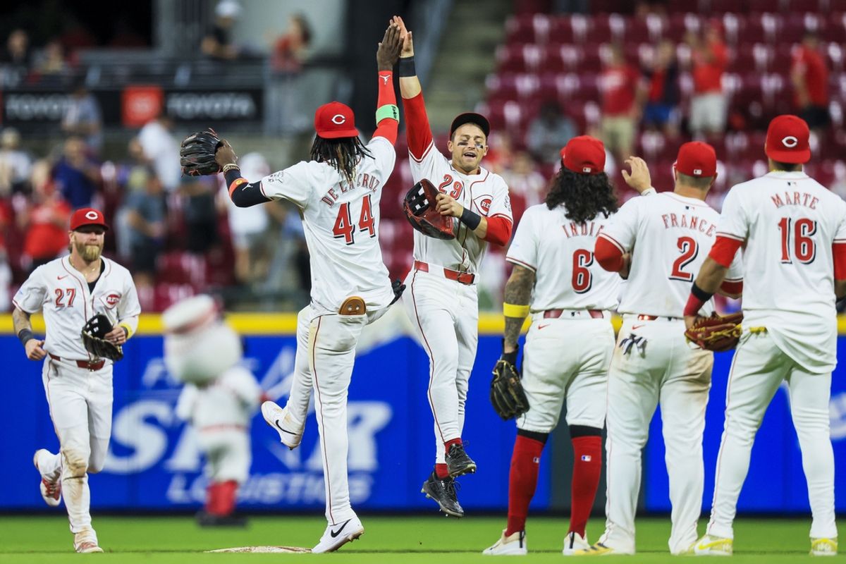 Sep 17, 2024; Cincinnati, Ohio, USA; Cincinnati Reds outfielder TJ Friedl (29) high fives shortstop Elly De La Cruz (44) after the victory over the Atlanta Braves at Great American Ball Park. Mandatory Credit: Katie Stratman-Imagn Images