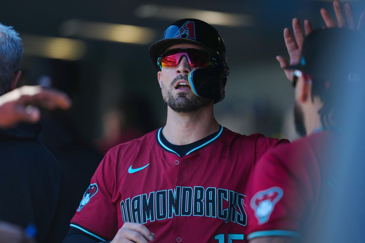 Sep 18, 2024; Denver, Colorado, USA; Arizona Diamondbacks outfielder Randal Grichuk (15) celebrates scoring a run in the first inning against the Colorado Rockies at Coors Field. Mandatory Credit: Ron Chenoy-Imagn Images
