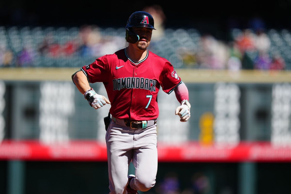 Sep 18, 2024; Denver, Colorado, USA; Arizona Diamondbacks outfielder Corbin Carroll (7) celebrates his solo home run in the first inning against the Colorado Rockies at Coors Field. Mandatory Credit: Ron Chenoy-Imagn Images