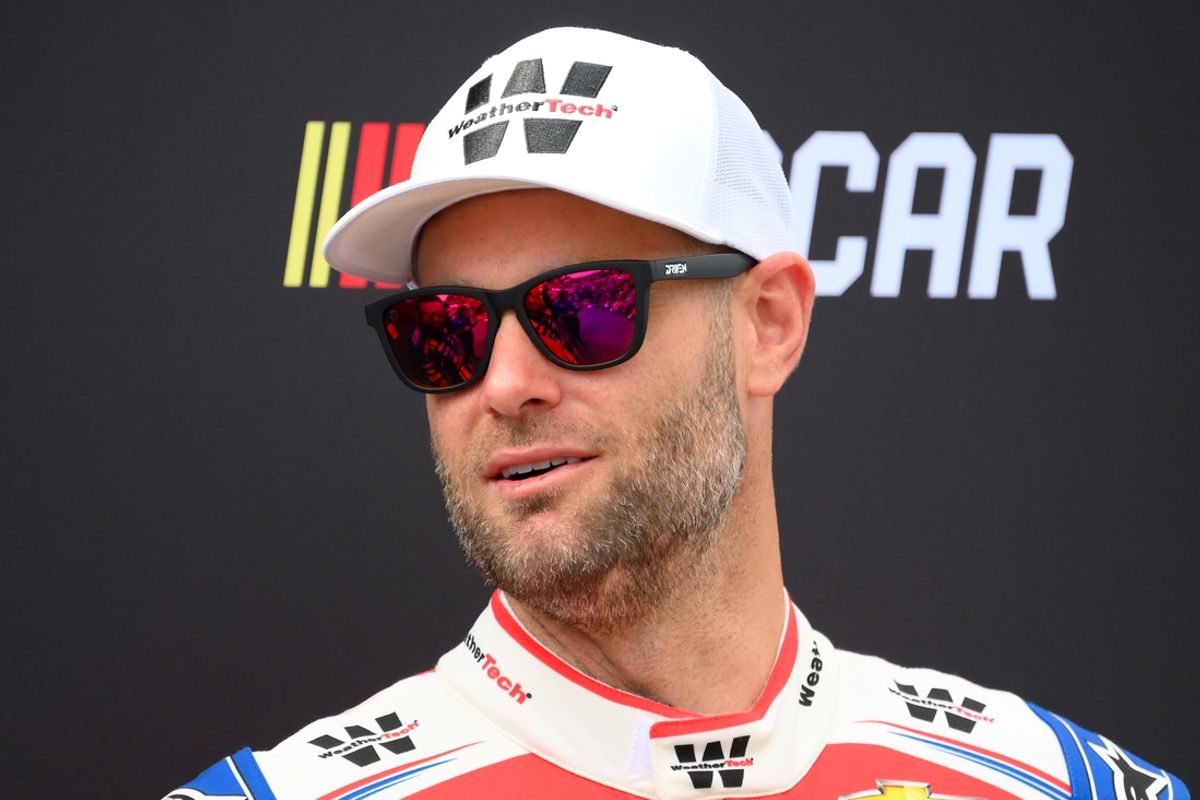 Sep 15, 2024; Watkins Glen, New York, USA; NASCAR Cup Series driver Shane van Gisbergen (16) looks on prior to the Go Bowling at The Glen at Watkins Glen International. Mandatory Credit: Rich Barnes-Imagn Images