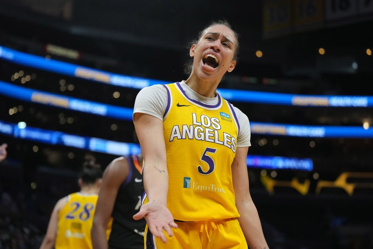Sep 17, 2024; Los Angeles, California, USA; LA Sparks forward Dearica Hamby (5) reacts against the Phoenix Mercury in the second half at Crypto.com Arena. Mandatory Credit: Kirby Lee-Imagn Images