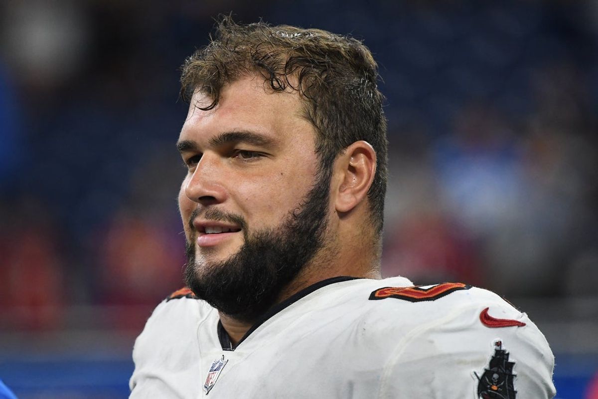 Sep 15, 2024; Detroit, Michigan, USA; Tampa Bay Buccaneers guard Ben Bredeson (68) talks with teammates after their game against the Detroit Lions at Ford Field. Mandatory Credit: Eamon Horwedel-Imagn Images