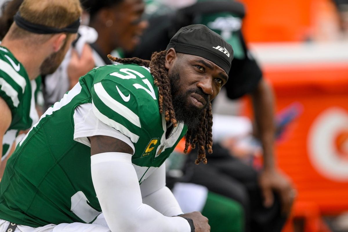 Sep 15, 2024; Nashville, Tennessee, USA;  New York Jets linebacker C.J. Mosley (57) looks up at the scoreboard from the bench against the Tennessee Titans during the second half during the second half at Nissan Stadium. Mandatory Credit: Steve Roberts-Imagn Images