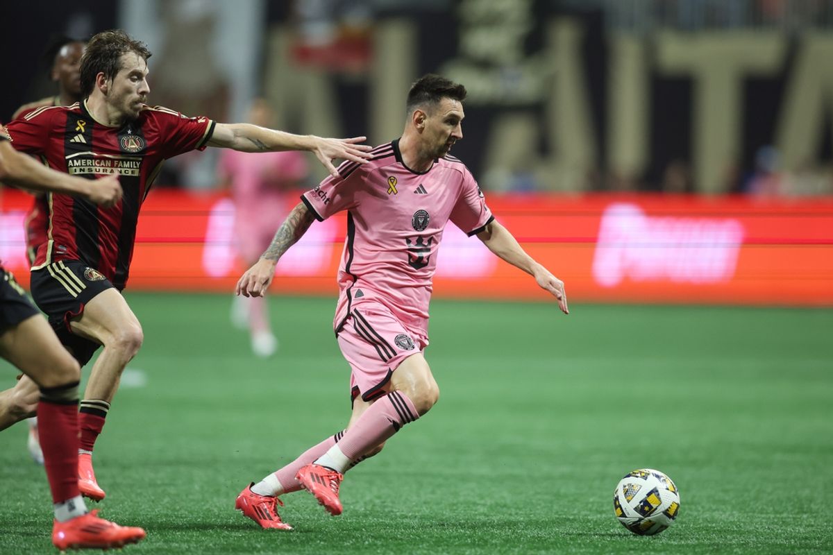 Sep 18, 2024; Atlanta, Georgia, USA; Inter Miami CF forward Lionel Messi (10) controls the ball against Atlanta United midfielder Saba Lobjanidze (9) in the second half at Mercedes-Benz Stadium. Mandatory Credit: Brett Davis-Imagn Images