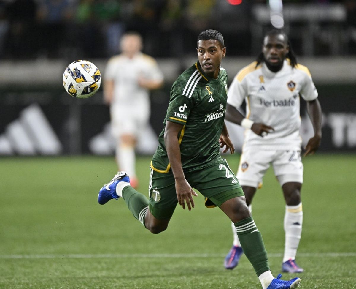 Sep 18, 2024; Portland, Oregon, USA; Portland Timbers defender Miguel Araujo (2) dribbles downfield during the first half against the LA Galaxy at Providence Park. Mandatory Credit: Troy Wayrynen-Imagn Images