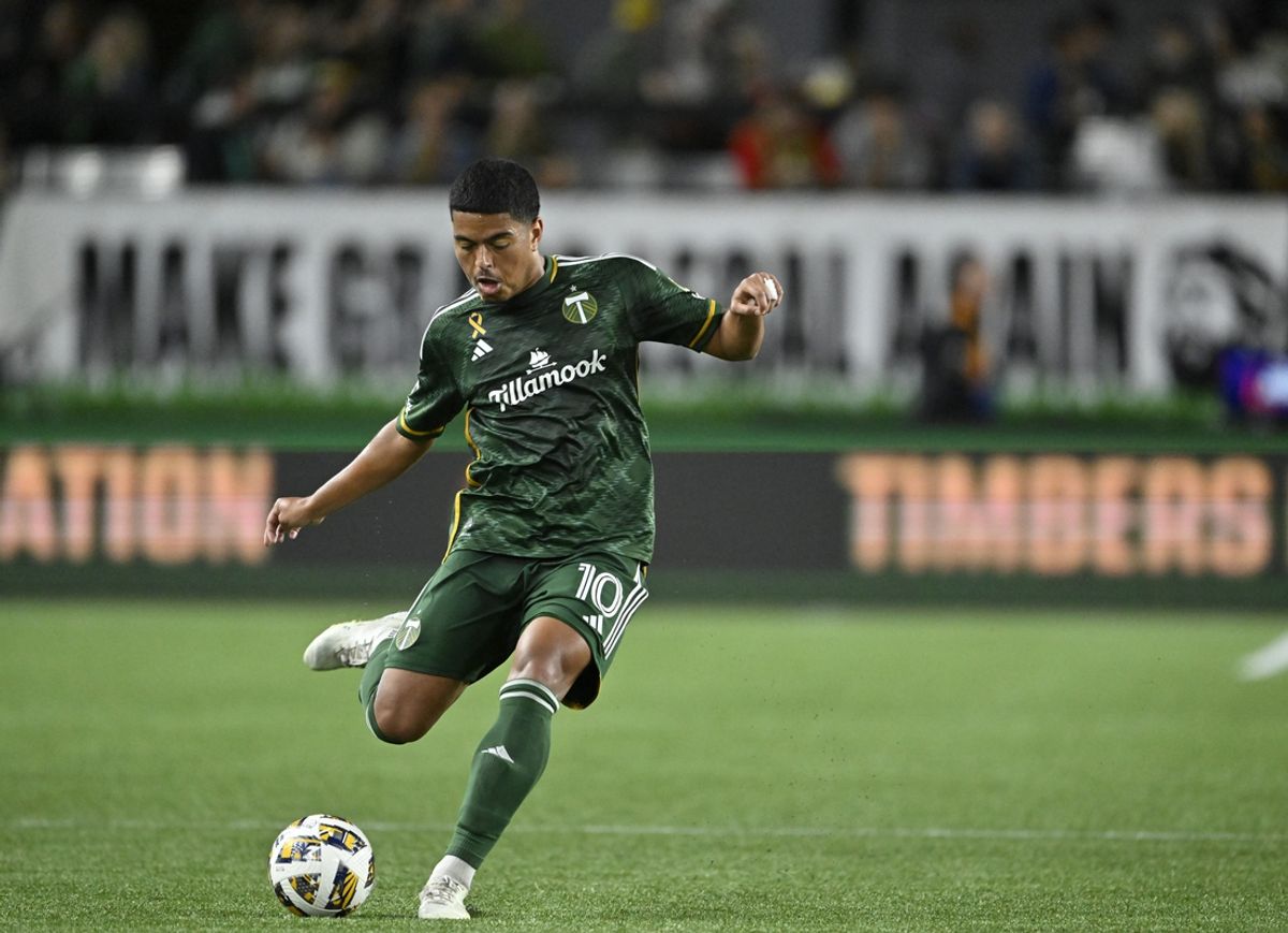 Sep 18, 2024; Portland, Oregon, USA; Portland Timbers midfielder Evander (10) kicks a ball downfield during the second half against the LA Galaxy at Providence Park. Mandatory Credit: Troy Wayrynen-Imagn Images