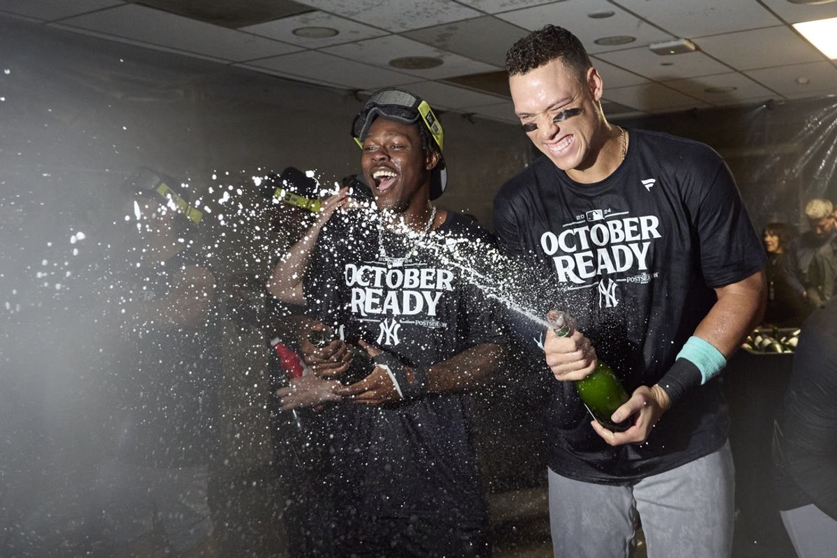 Sep 18, 2024; Seattle, Washington, USA; New York Yankees third baseman Jazz Chisholm Jr. and designated hitter Aaron Judge celebrate clinching a playoff spot after beating the Seattle Mariners at T-Mobile Park. Mandatory Credit: John Froschauer-Imagn Images