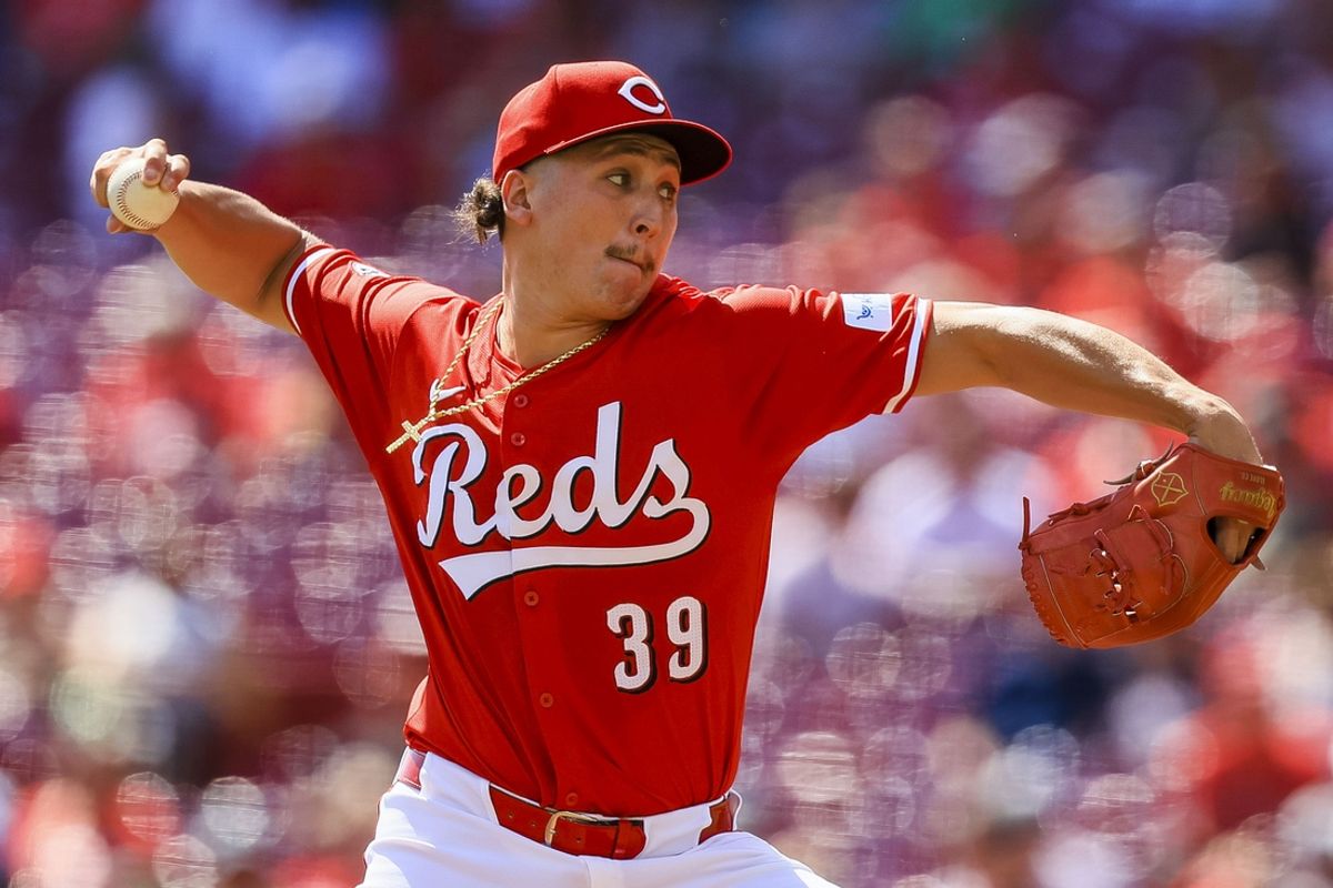 Sep 19, 2024; Cincinnati, Ohio, USA; Cincinnati Reds starting pitcher Julian Aguiar (39) pitches against the Atlanta Braves in the first inning at Great American Ball Park. Mandatory Credit: Katie Stratman-Imagn Images