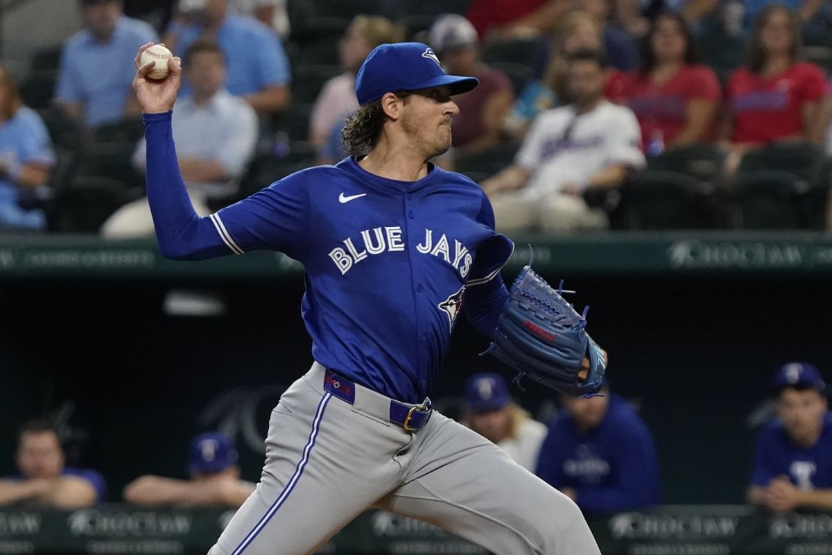 Sep 19, 2024; Arlington, Texas, USA; Toronto Blue Jays pitcher Kevin Gausman (34) throws to the plate during the first inning against the Texas Rangers at Globe Life Field. Mandatory Credit: Raymond Carlin III-Imagn Images