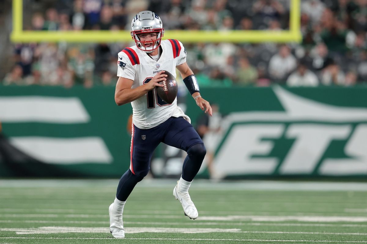 Sep 19, 2024; East Rutherford, New Jersey, USA; New England Patriots quarterback Drake Maye (10) runs with the ball against the New York Jets during the fourth quarter at MetLife Stadium. Mandatory Credit: Brad Penner-Imagn Images