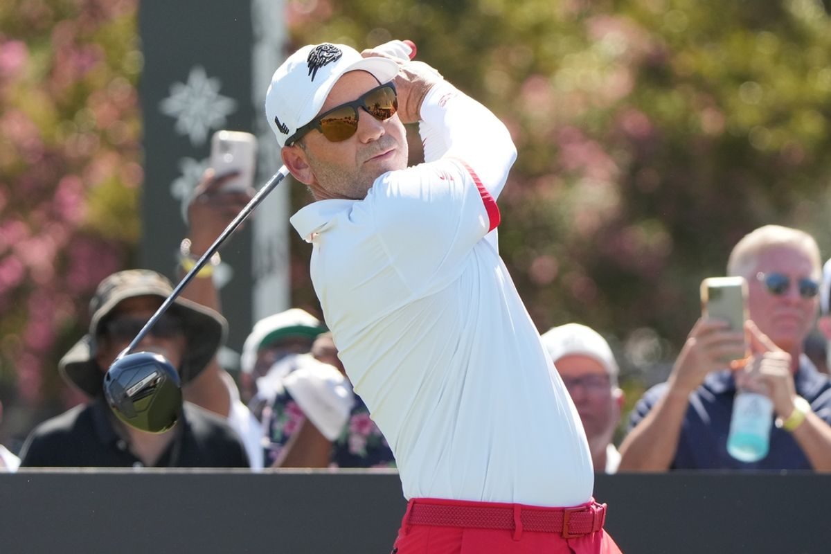 Sep 20, 2024; Carrolton, Texas, USA; Sergio Garcia plays his shot from the tenth tee during the LIV Golf Dallas Team Championship at Maridoe Golf Club. Mandatory Credit: Jim Cowsert-Imagn Images