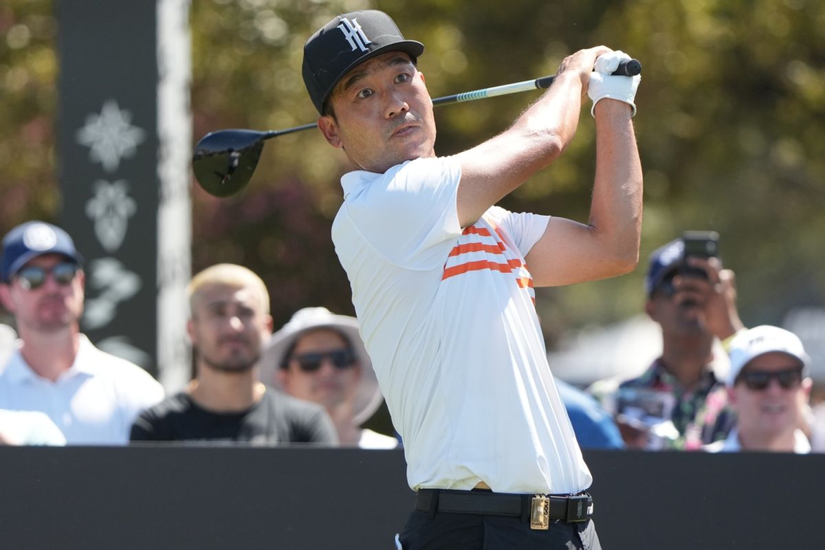 Sep 20, 2024; Carrolton, Texas, USA; Kevin Na plays his shot from the tenth tee during the LIV Golf Dallas Team Championship at Maridoe Golf Club. Mandatory Credit: Jim Cowsert-Imagn Images
