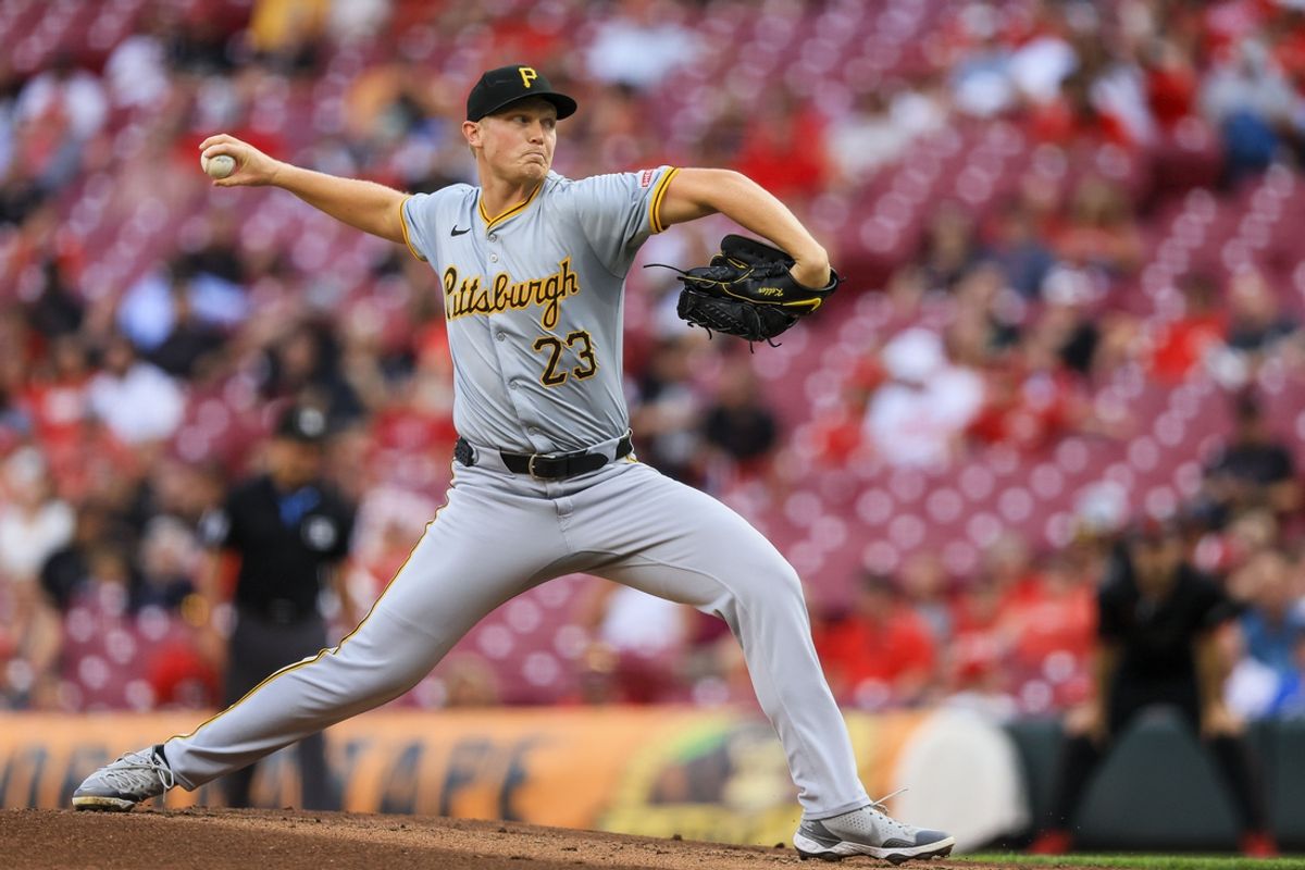 Sep 20, 2024; Cincinnati, Ohio, USA; Pittsburgh Pirates starting pitcher Mitch Keller (23) pitches against the Cincinnati Reds in the first inning at Great American Ball Park. Mandatory Credit: Katie Stratman-Imagn Images