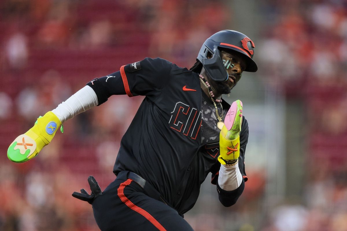 Sep 20, 2024; Cincinnati, Ohio, USA; Cincinnati Reds shortstop Elly De La Cruz (44) scores on a three-run double hit by catcher Tyler Stephenson (not pictured) in the third inning against the Pittsburgh Pirates at Great American Ball Park. Mandatory Credit: Katie Stratman-Imagn Images