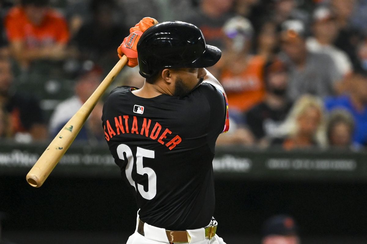Sep 20, 2024; Baltimore, Maryland, USA;  Baltimore Orioles outfielder Anthony Santander (25) swings through a first inning two run home run against the Detroit Tigers at Oriole Park at Camden Yards. Mandatory Credit: Tommy Gilligan-Imagn Images