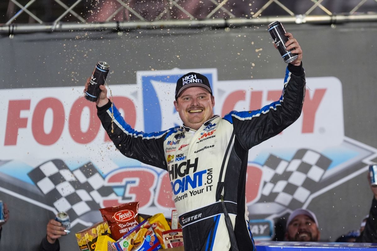 Sep 20, 2024; Bristol, Tennessee, USA; NASCAR Xfinity Series driver Cole Custer (00) celebrates after winning the Food City 300 at Bristol Motor Speedway. Mandatory Credit: Randy Sartin-Imagn Images