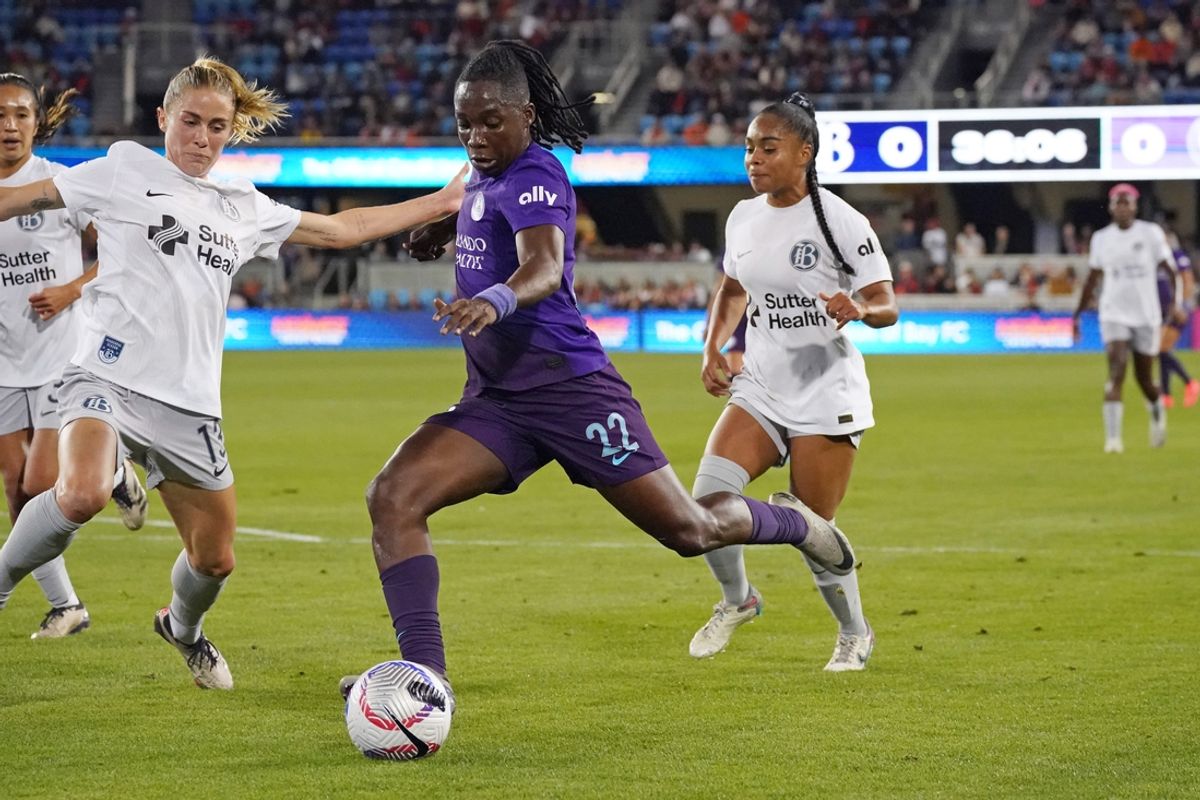 Sep 20, 2024; San Jose, California, USA;  Orlando Pride forward Barbra Banda (22) battles for the ball against Bay FC defender Abby Dahlkemper (13) during the first half at PayPal Park. Mandatory Credit: David Gonzales-Imagn Images