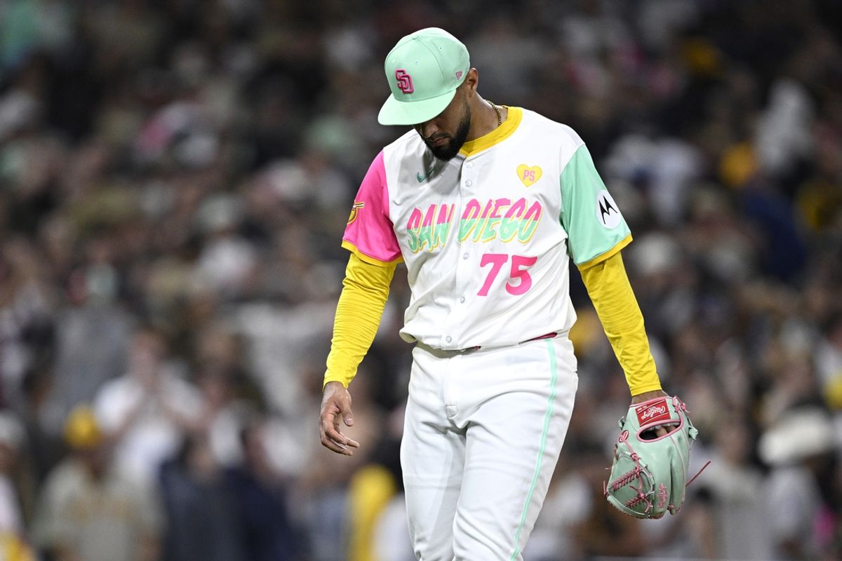Sep 20, 2024; San Diego, California, USA; San Diego Padres relief pitcher Robert Suarez (75) looks on after a two-run home run hit by Chicago White Sox second baseman Lenyn Sosa (not pictured) during the ninth inning at Petco Park. Mandatory Credit: Orlando Ramirez-Imagn Images