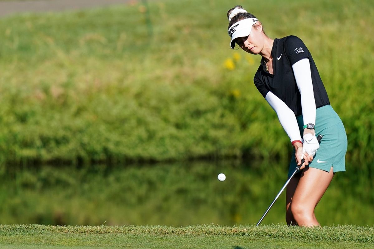 Nelly Korda hits the ball in the third hole during the 2024 Kroger Queen City Championships, Saturday, Sept. 21, 2024, at TPC River Bend golf course in Maineville, Ohio.