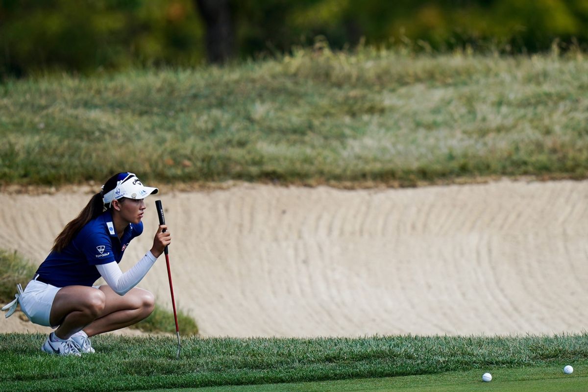 Jeeno Thitikul sizes up on the seventh hole during the 2024 Kroger Queen City Championships, Saturday, Sept. 21, 2024, at TPC River Bend golf course in Maineville, Ohio.