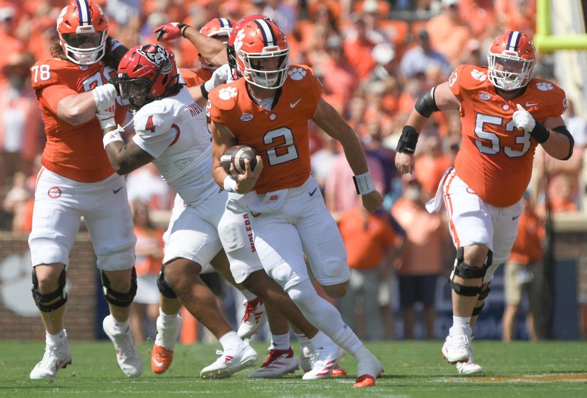 Sep 21, 2024; Clemson, South Carolina, USA; Clemson Tigers quarterback Cade Klubnik (2) runs for a touchdown against the North Carolina State Wolfpack during the first quarter at Memorial Stadium. Mandatory Credit: Ken Ruinard-Imagn Images