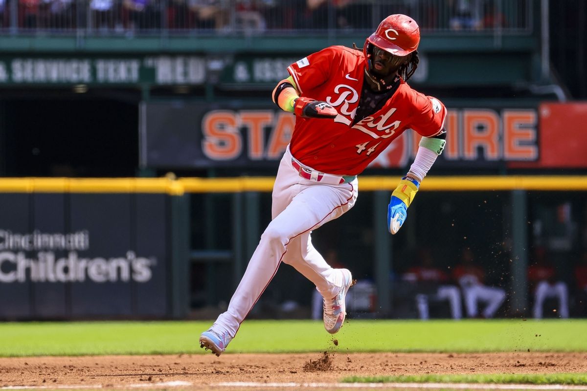 Sep 21, 2024; Cincinnati, Ohio, USA; Cincinnati Reds shortstop Elly De La Cruz (44) scores on a single hit by catcher Tyler Stephenson (not pictured) in the third inning against the Pittsburgh Pirates at Great American Ball Park. Mandatory Credit: Katie Stratman-Imagn Images