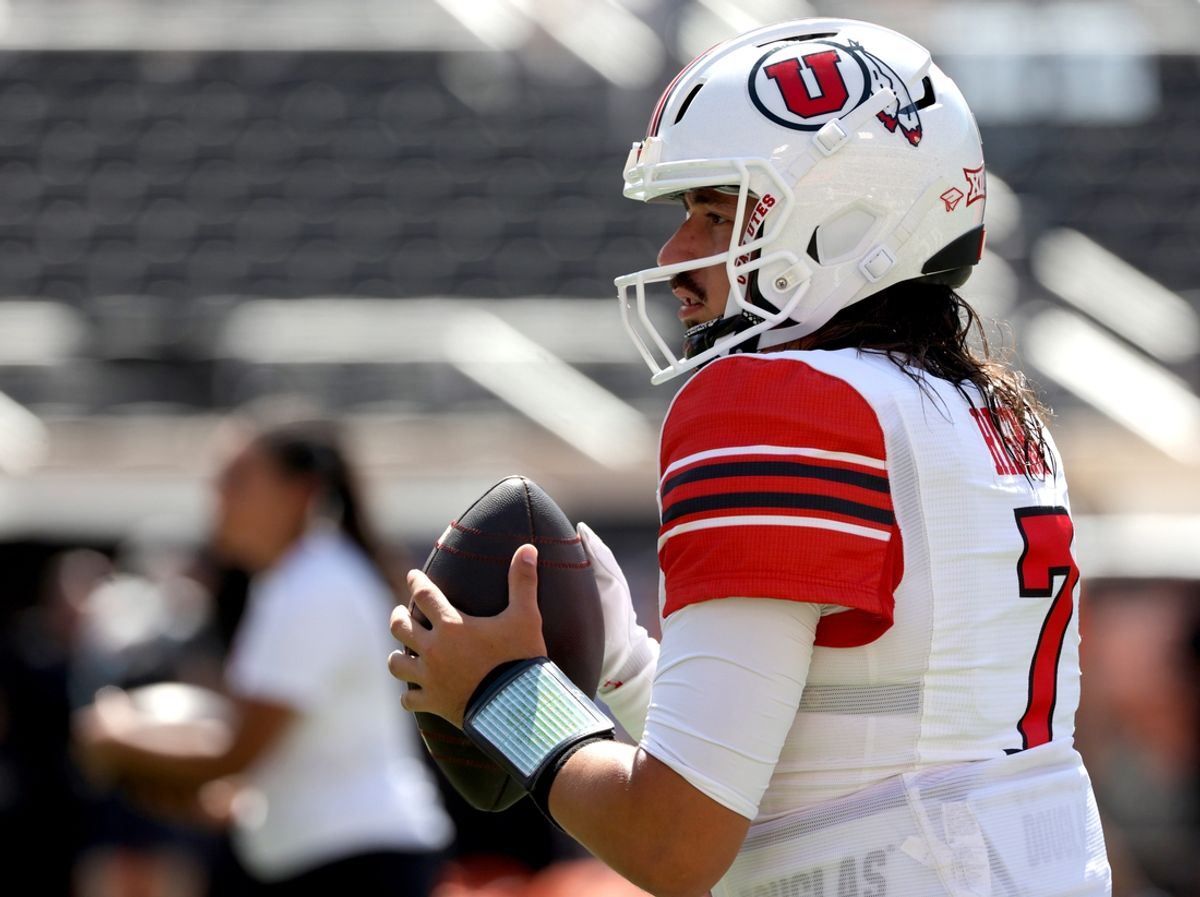 Utah's Cameron Rising (7) warms up before the college football between the Oklahoma State University Cowboys and the Utah Utes at Boone Pickens Stadium in Stillwater, Okla., Saturday, Sept., 21, 2024.
