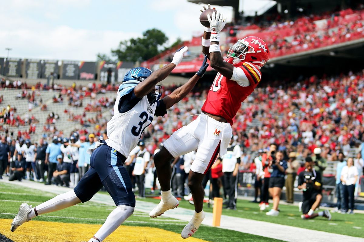 Sep 21, 2024; College Park, Maryland, USA; Maryland Terrapins wide receiver Tai Felton (10) makes a touchdown catch over Villanova Wildcats defensive back Zahmir Dawud (37) during the third quarter at SECU Stadium. Mandatory Credit: Daniel Kucin Jr.-Imagn Images