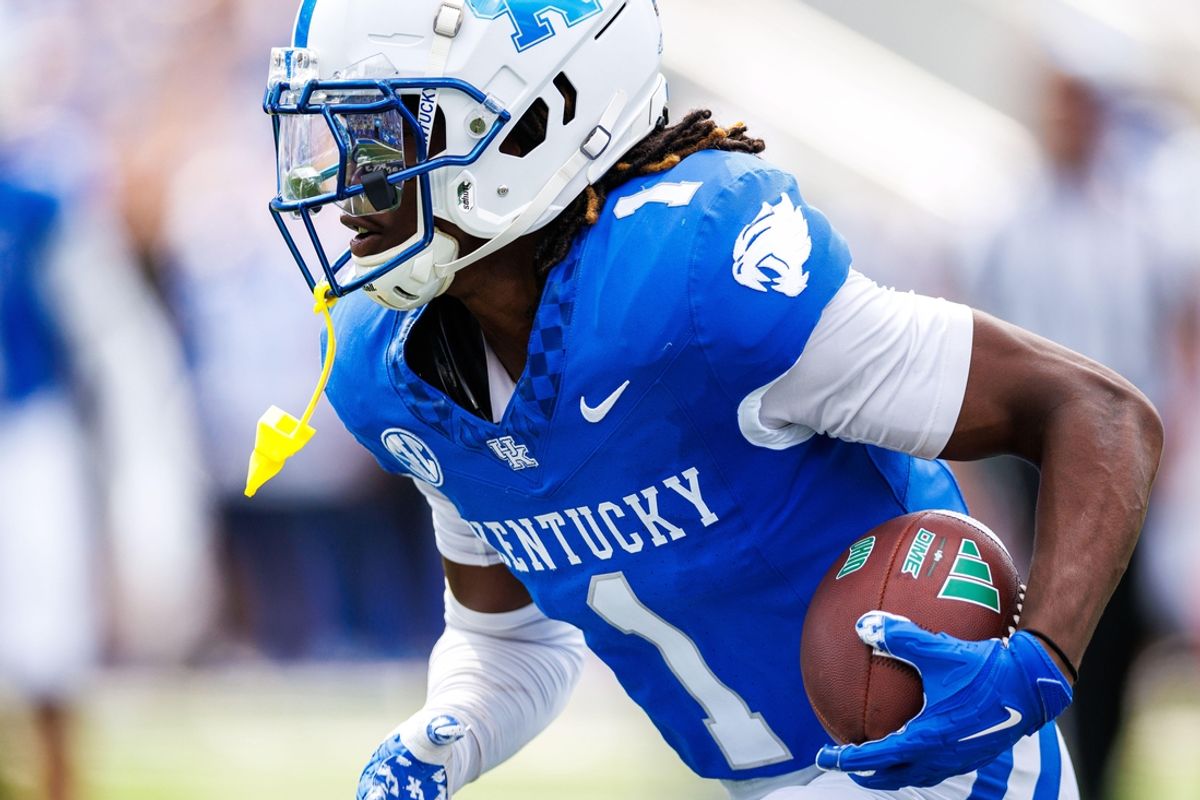 Sep 21, 2024; Lexington, Kentucky, USA; Kentucky Wildcats defensive back Maxwell Hairston (1) intercepts an Ohio Bobcats pass and carries it towards the end zone during the third quarter at Kroger Field. Mandatory Credit: Jordan Prather-Imagn Images