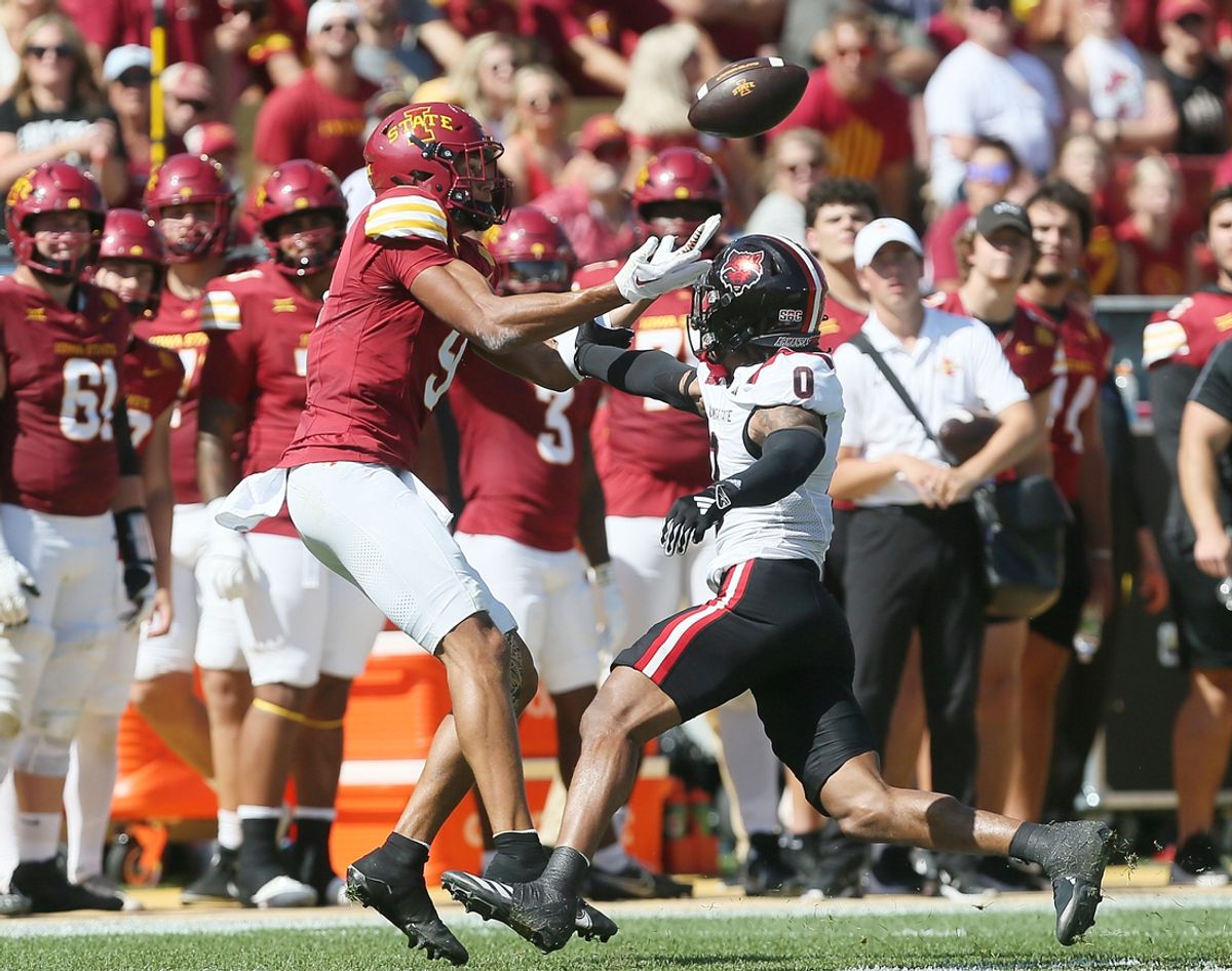 Iowa State Cyclones wide receiver Jayden Higgins (9) catches the ball around Arkansas State Red Wolves cornerback Justin Hodges (0) during the first quarter in the week-4 NCAA football at Jack Trice Stadium on Saturday, Sept. 21, 2024, in Ames, Iowa.