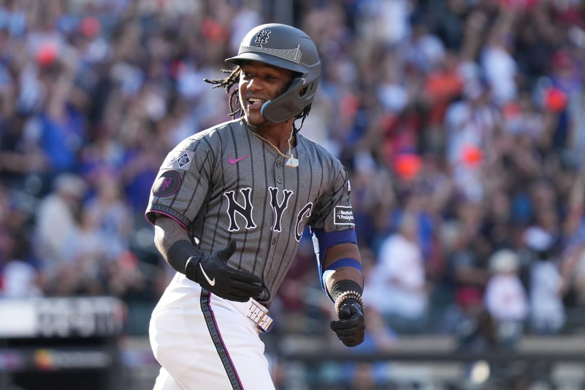 Sep 21, 2024; New York City, New York, USA; New York Mets shortstop Luisangel Acuña (2) celebrates after hitting a home run during the second inning against the Philadelphia Phillies at Citi Field. Mandatory Credit: Lucas Boland-Imagn Images