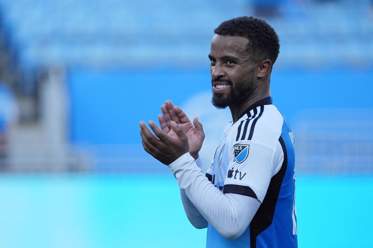 Sep 21, 2024; Charlotte, North Carolina, USA; Charlotte FC defender Nathan Byrne (14) acknowledges fans after the victory over New England Revolution at Bank of America Stadium. Mandatory Credit: Jim Dedmon-Imagn Images