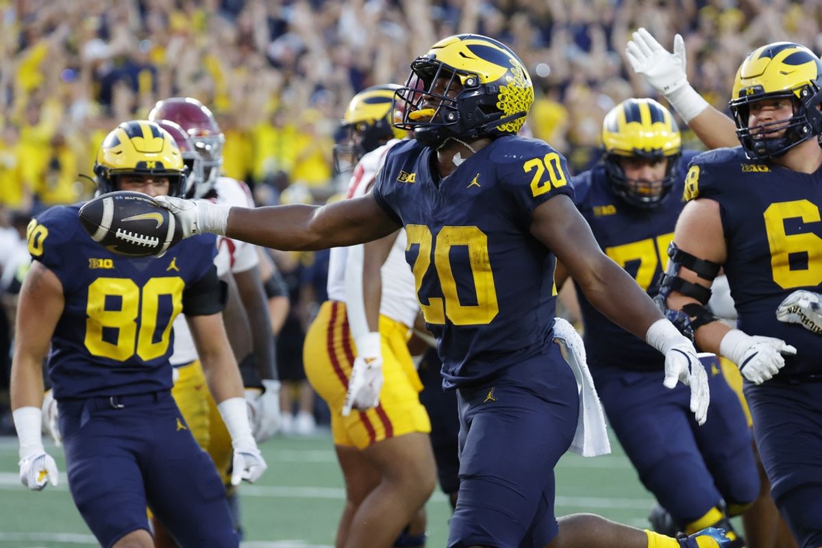 Sep 21, 2024; Ann Arbor, Michigan, USA;  Michigan Wolverines running back Kalel Mullings (20) celebrates after he rushes for a touchdown in the second half against the USC Trojans at Michigan Stadium. Mandatory Credit: Rick Osentoski-Imagn Images