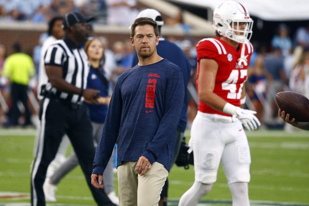 Sep 21, 2024; Oxford, Mississippi, USA; Mississippi Rebels offensive coordinator Charlie Weis Jr. watches during warm ups prior to the game against the Georgia Southern Eagles at Vaught-Hemingway Stadium. Mandatory Credit: Petre Thomas-Imagn Images