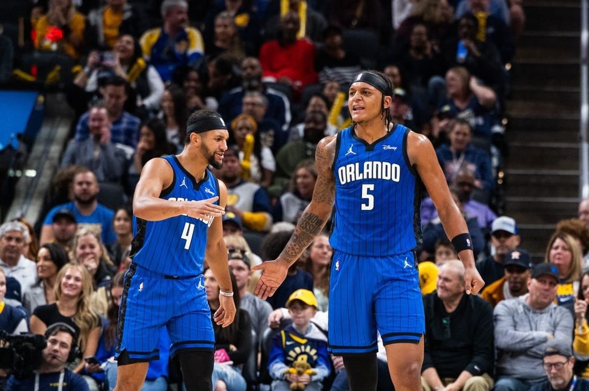 Nov 19, 2023; Indianapolis, Indiana, USA; Orlando Magic forward Paolo Banchero (5)  celebrates his made slam dunk with  guard Jalen Suggs (4) in the first half against the Indiana Pacers at Gainbridge Fieldhouse.